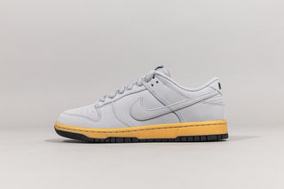 Tenis Hombre Nike Dunk Low Retro SE Gris lobo chicle