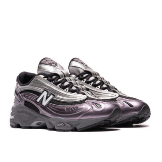 Tenis Hombre New Balance 1000 Vino Gris Metalico vista lateral par