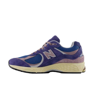 Tenis Unisex New Balance 2002R Morado vista lateral principal