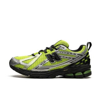 Tenis Hombre New Balance 1906R Negro Amarillo vista lateral principal